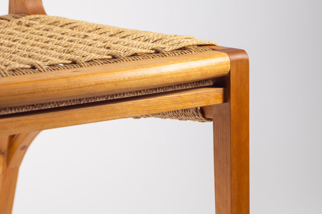 Lupin Chair — seat corner detail showing cord and cherry frame