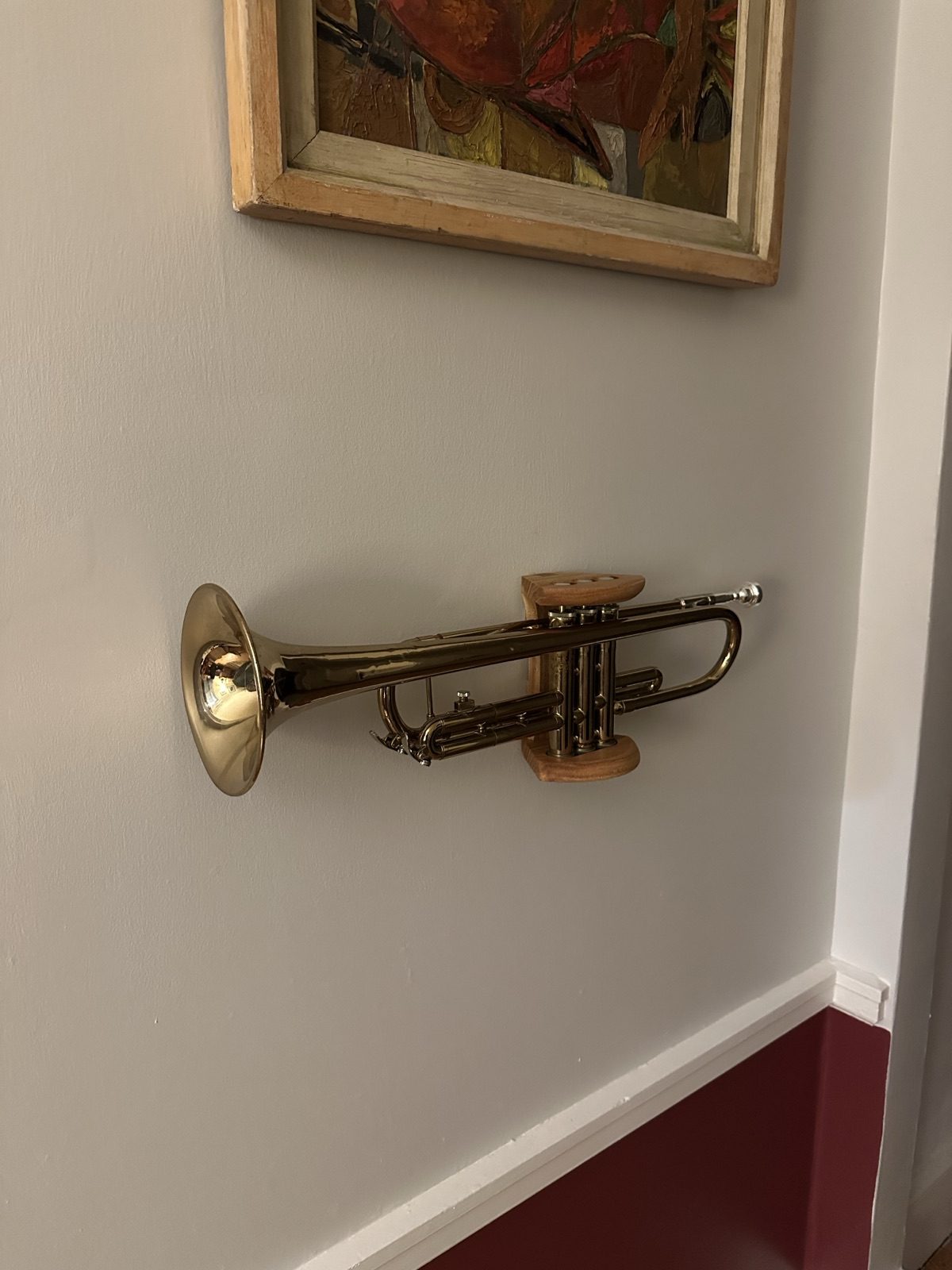 Press Play — trumpet mounted on wall