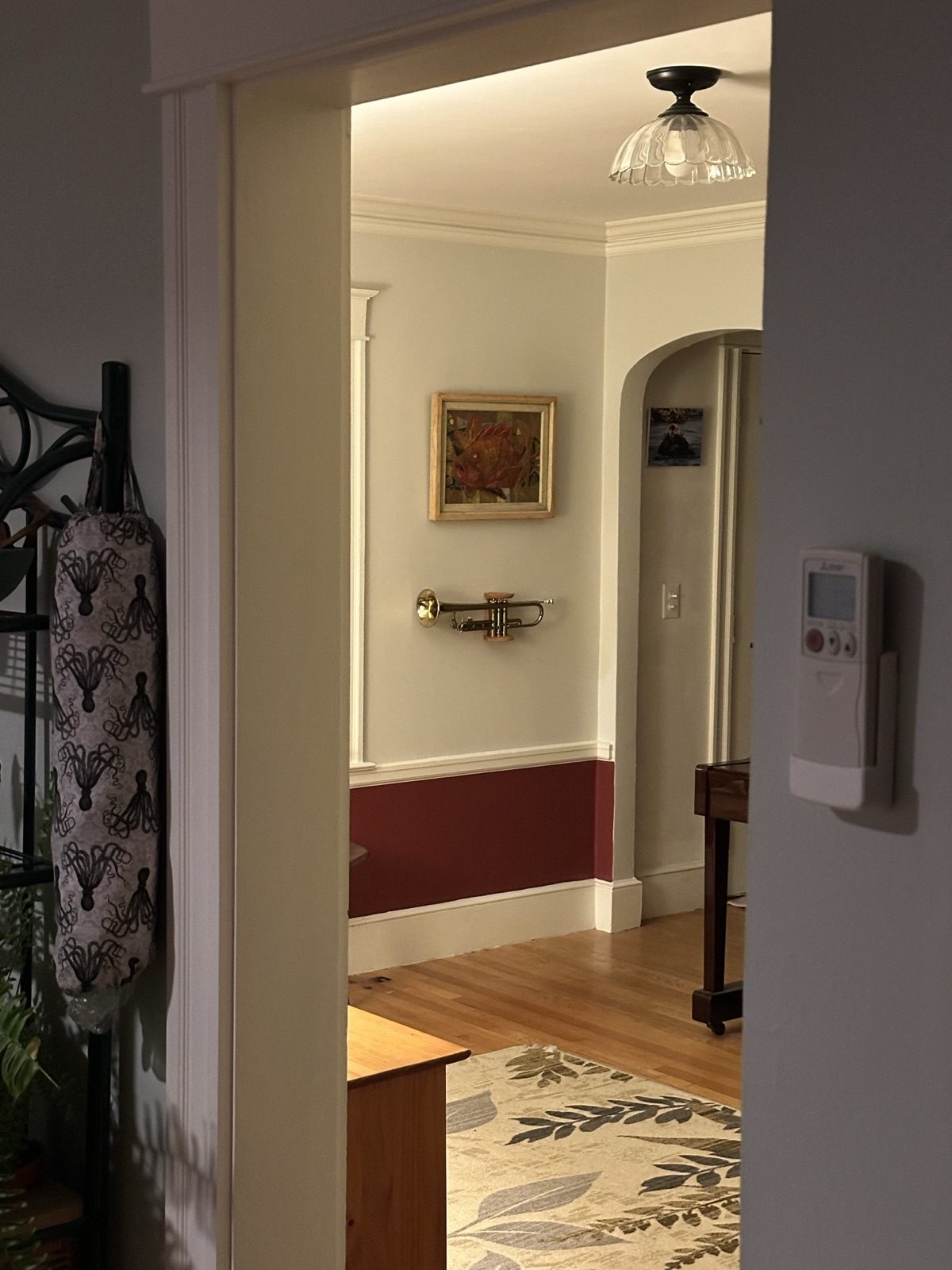 Press Play — room context showing trumpet as wall art