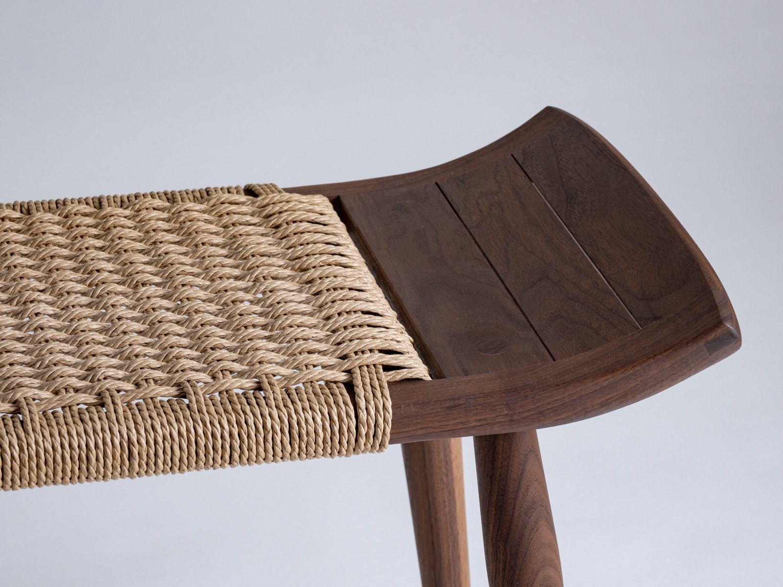 Two Sons — cord weave and walnut end detail